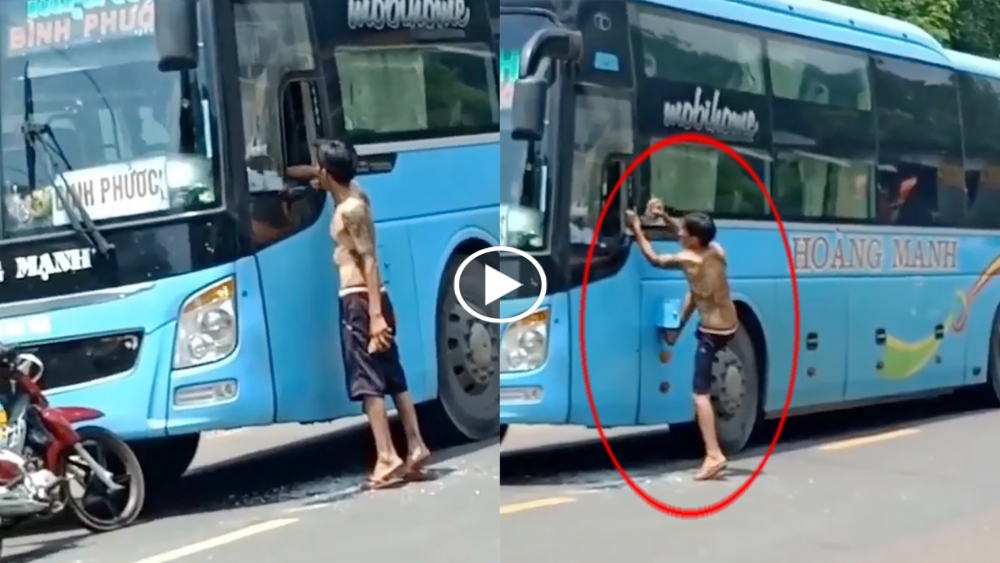 Người đàn ông cởi trần, cầm gạch đập kính ô tô khách giữa đường Người đàn ông cởi trần, cầm gạch đập kính ô tô khách giữa đường