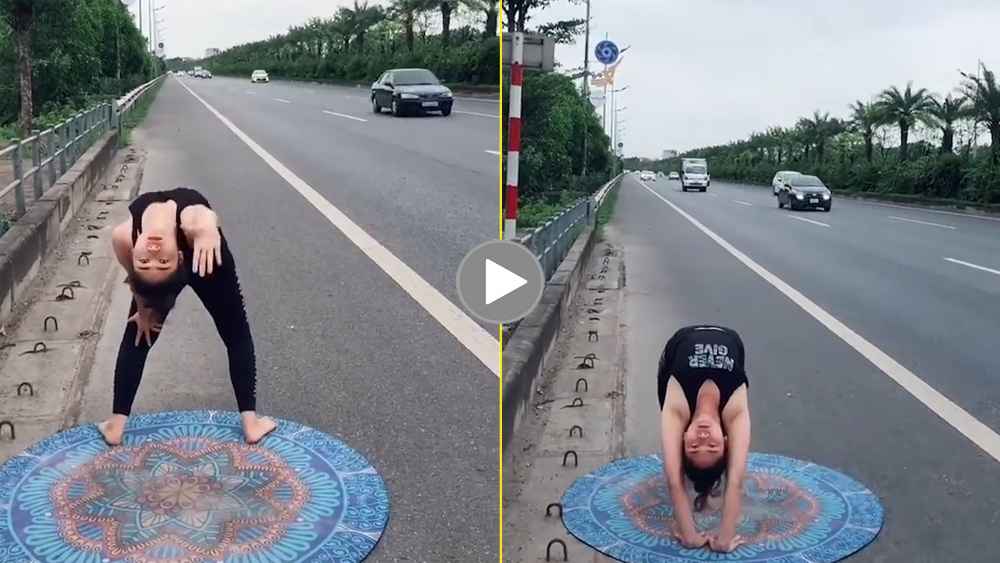 Cô gái 'hồn nhiên' trải thảm tập Yoga ngay trên cao tốc Cô gái 'hồn nhiên' trải thảm tập Yoga ngay trên cao tốc
