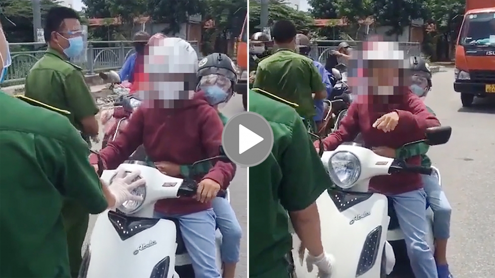 Người phụ nữ chở con, vít ga xe máy đòi thông chốt kiểm dịch Người phụ nữ chở con, vít ga xe máy đòi thông chốt kiểm dịch