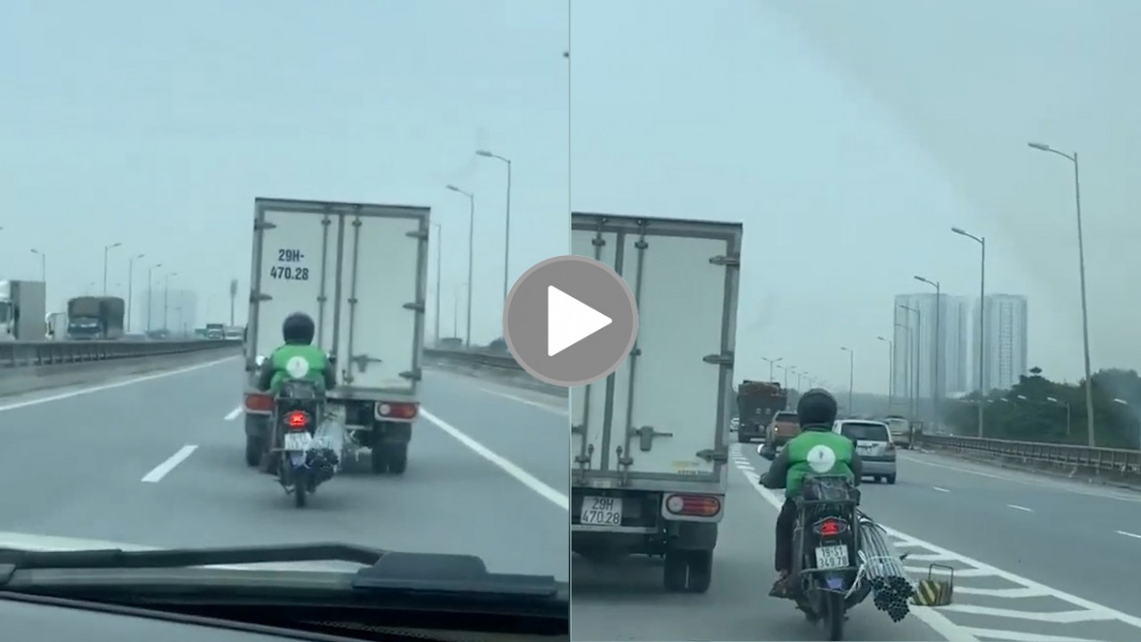 Thanh niên chở hành cồng kềnh, thản nhiên đi lên vành đai 3 Thanh niên chở hành cồng kềnh, thản nhiên đi lên vành đai 3