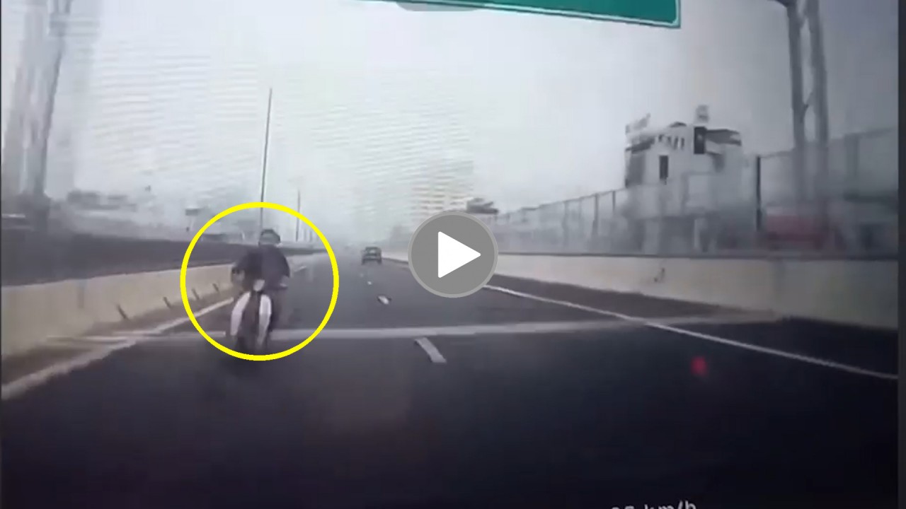 Tài xế nhanh tay đánh lái tránh người đi xe máy ngược chiều trên vành đai 3 Tài xế nhanh tay đánh lái tránh người đi xe máy ngược chiều trên vành đai 3