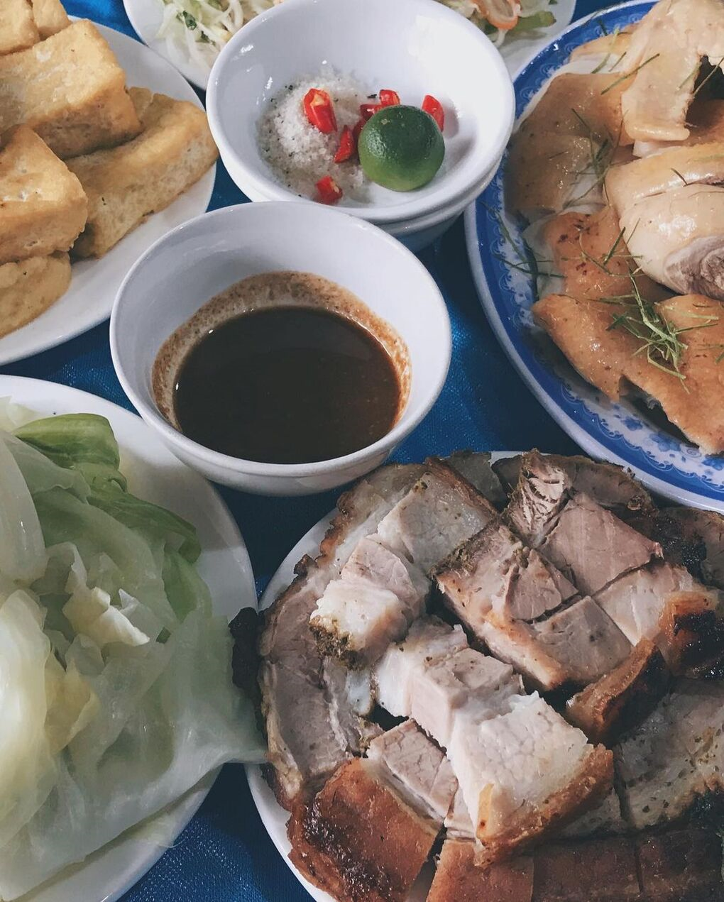 Famous Crispy Pork Roasted on Carrying Poles in Duong Lam Ancient Village Famous Crispy Pork Roasted on Carrying Poles in Duong Lam Ancient Village