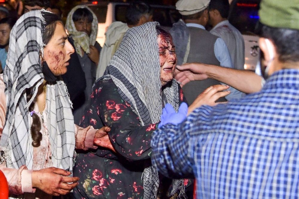 Ảnh: Kabul tang thương và hỗn loạn sau vụ đánh bom đẫm máu Ảnh: Kabul tang thương và hỗn loạn sau vụ đánh bom đẫm máu