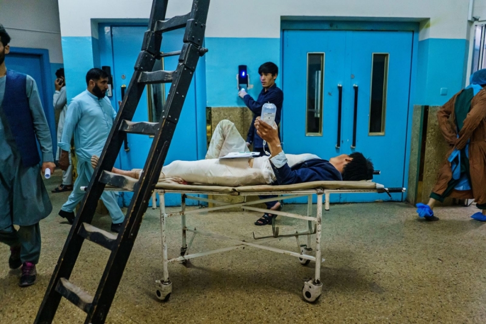 Ảnh: Kabul tang thương và hỗn loạn sau vụ đánh bom đẫm máu Ảnh: Kabul tang thương và hỗn loạn sau vụ đánh bom đẫm máu