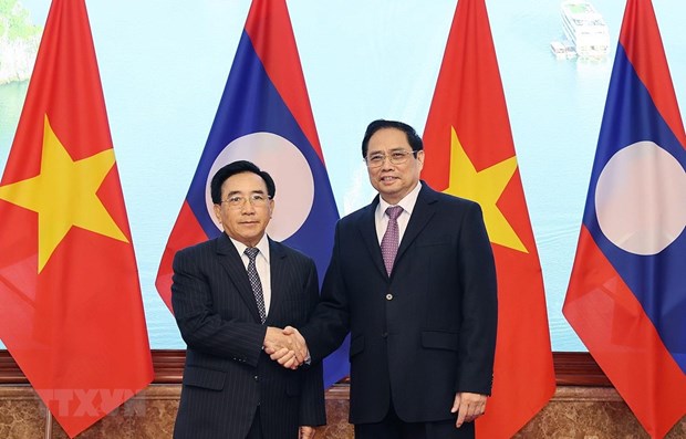 Cùng xây đắp vận mệnh giữa hai dân tộc Việt Nam và Lào hình ảnh 2 Cung xay dap van menh giua hai dan toc Viet Nam va Lao hinh anh 2