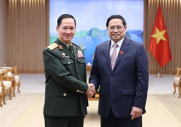 越南政府总理范明政会见老挝人民军总参谋长坎良·奥萨宋 越南政府总理范明政会见老挝人民军总参谋长坎良·奥萨宋