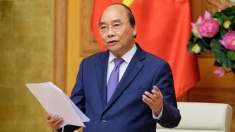 越南国家主席阮春福向全国伤病残军人、烈士家属和革命有功者致信