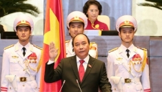 中国领导致电祝贺阮春福同志当选国家主席和范明政同志当选政府总理