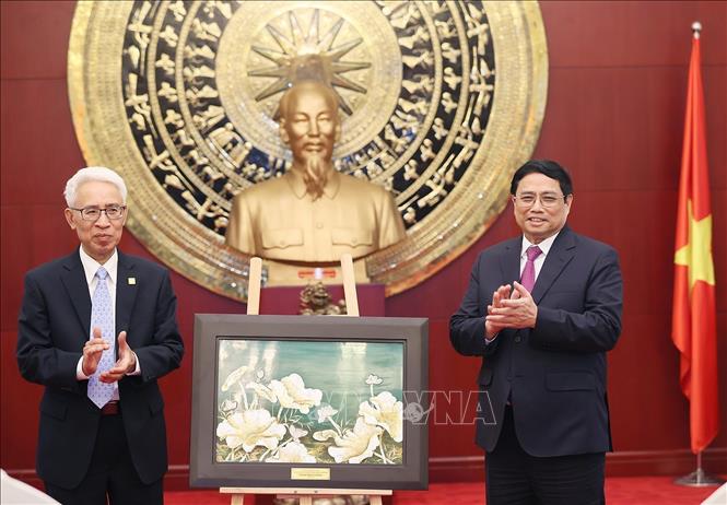 Thủ tướng Phạm Minh Chính gặp gỡ cộng đồng người Việt Nam tại Trung Quốc Chú thích ảnh