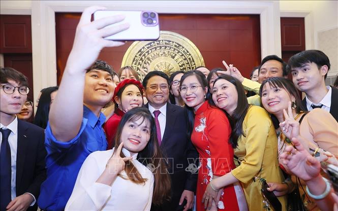 Thủ tướng Phạm Minh Chính gặp gỡ cộng đồng người Việt Nam tại Trung Quốc Chú thích ảnh