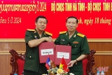 ລົງ​ນາມ​ໃນຂໍ້ຕົກລົງການ​ຮ່ວມ​ມື​ດ້ານ​ການ​ທະ​ຫານ - ການ​ປ້ອງ​ກັນ​ປະ​ເທດ ​ລະ​ຫວ່າງແຂວງ ຮ່າ​ຕິ້ງ ແລະ ແຂວງ​ບໍ​ລິ​ຄຳ​ໄຊ