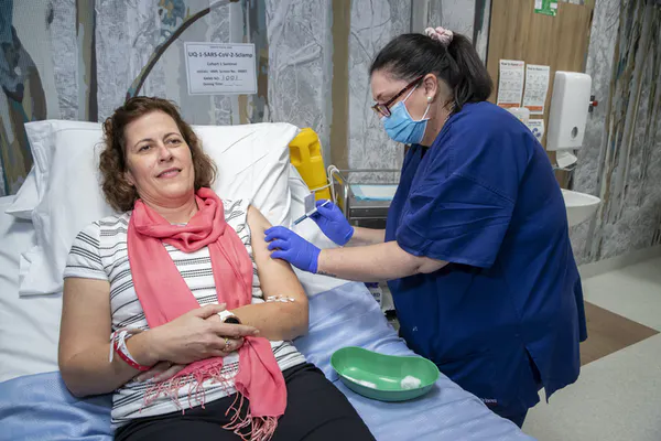 A volunteer in the University of Queensland’s phase 1 trials of it’s COVID-19 vaccine candidate. Glenn Hunt/AAP 3335 file 20200721 37 1we6nhe