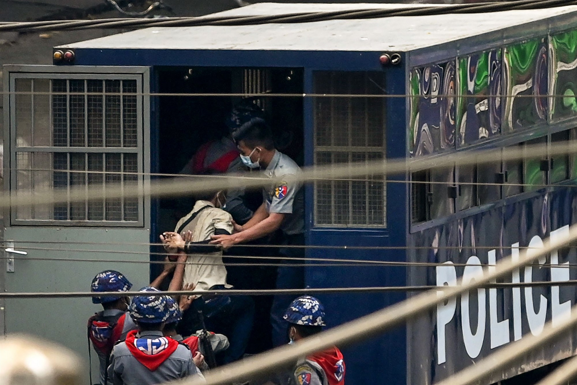 Police arrest a man in Yangon on Saturday, after a crackdown on demonstrations by protesters against the military coup.SAI AUNG MAIN / AFP - Getty Images 2225-210227-myanmar-police-ha-daad64cd133850537a81deffdfd81e79fit-2000w