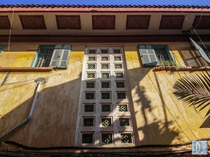 Yellow walls and green windows are typical characteristics of French colonial architecture in Vietnam. Photo: Ho Hoang Hai. 5505-biet20thu20bao20dai20ho20hoang20hai2014