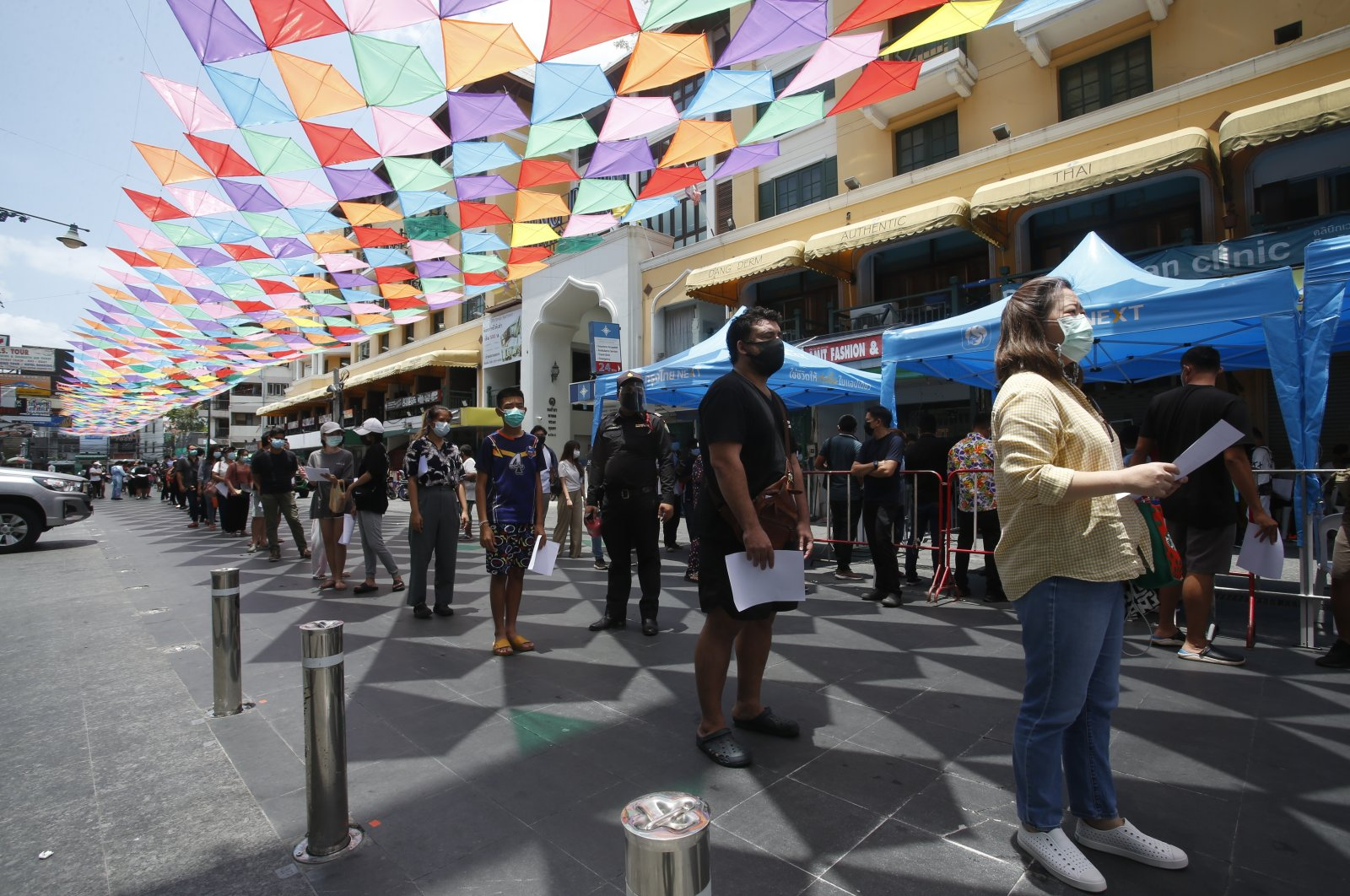 People wait in line for Covid-19 swab tests in Khaosan Road, Bangkok, Thailand (Photo: AP) People wait in line for Covid-19 swab tests in Khaosan Road, Bangkok, Thailand (Photo: AP)