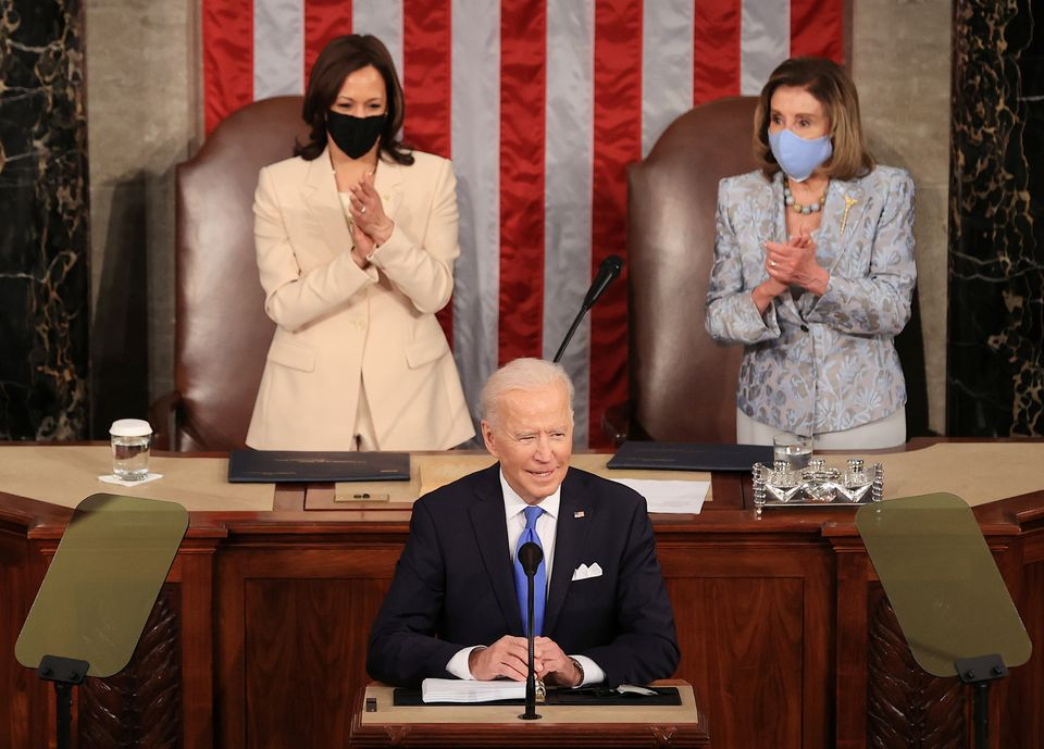 U.S. President Joe Biden addresses a joint session of Congress as President Kamala Harris and Speaker of the House U.S. Rep. Nancy Pelosi (D-CA) react in the U.S. Capitol in Washington, DC, U.S. April 28, 2021. Chip Somodevillaat/Pool via REUTERS U.S. President Joe Biden addresses a joint session of Congress as President Kamala Harris and Speaker of the House U.S. Rep. Nancy Pelosi (D-CA) react in the U.S. Capitol in Washington, DC, U.S. April 28, 2021. Chip Somodevillaat/Pool via REUTERS