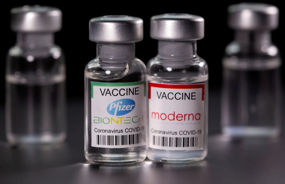 Vials with Pfizer-BioNTech and Moderna coronavirus disease (COVID-19) vaccine labels are seen in this illustration picture taken March 19, 2021. REUTERS/Dado Ruvic/File Photo Vials with Pfizer-BioNTech and Moderna coronavirus disease (COVID-19) vaccine labels are seen in this illustration picture taken March 19, 2021. REUTERS/Dado Ruvic/File Photo