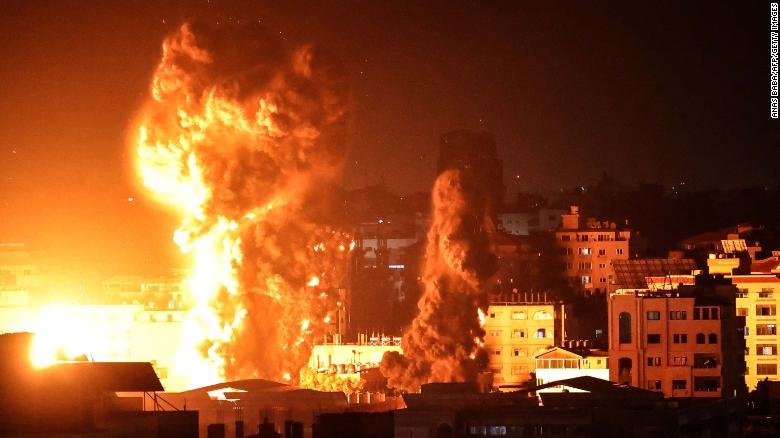 Smoke rises above buildings in Gaza City as Israeli warplanes target the Palestinian enclaves early Monday. (Photo: CNN) Smoke rises above buildings in Gaza City as Israeli warplanes target the Palestinian enclaves early Monday. (Photo: CNN)