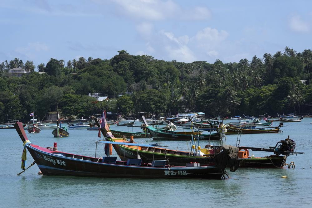 Empty tourist boats sit at anchor at Rawai Beach on Phuket, southern Thailand, Monday, June 28, 2021. Photo: AP Empty tourist boats sit at anchor at Rawai Beach on Phuket, southern Thailand, Monday, June 28, 2021. Photo: AP