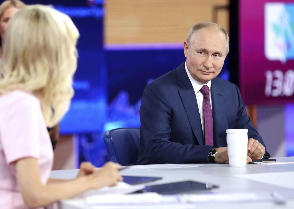 Russian President Vladimir Putin attends his annual live call-in show in Moscow, Russia, Wednesday, June 30, 2021. Photo: AP Russian President Vladimir Putin attends his annual live call-in show in Moscow, Russia, Wednesday, June 30, 2021. Photo: AP