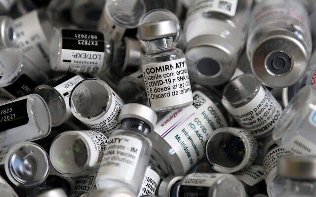 Empty vials of the Pfizer-BioNTech COVID-19 vaccine lie in a box during a vaccine campaign at the Vaccine Village in Ebersberg near Munich, Germany, May 15, 2021. (AP Photo/Matthias Schrader) Empty vials of the Pfizer-BioNTech COVID-19 vaccine lie in a box during a vaccine campaign at the Vaccine Village in Ebersberg near Munich, Germany, May 15, 2021. (AP Photo/Matthias Schrader)