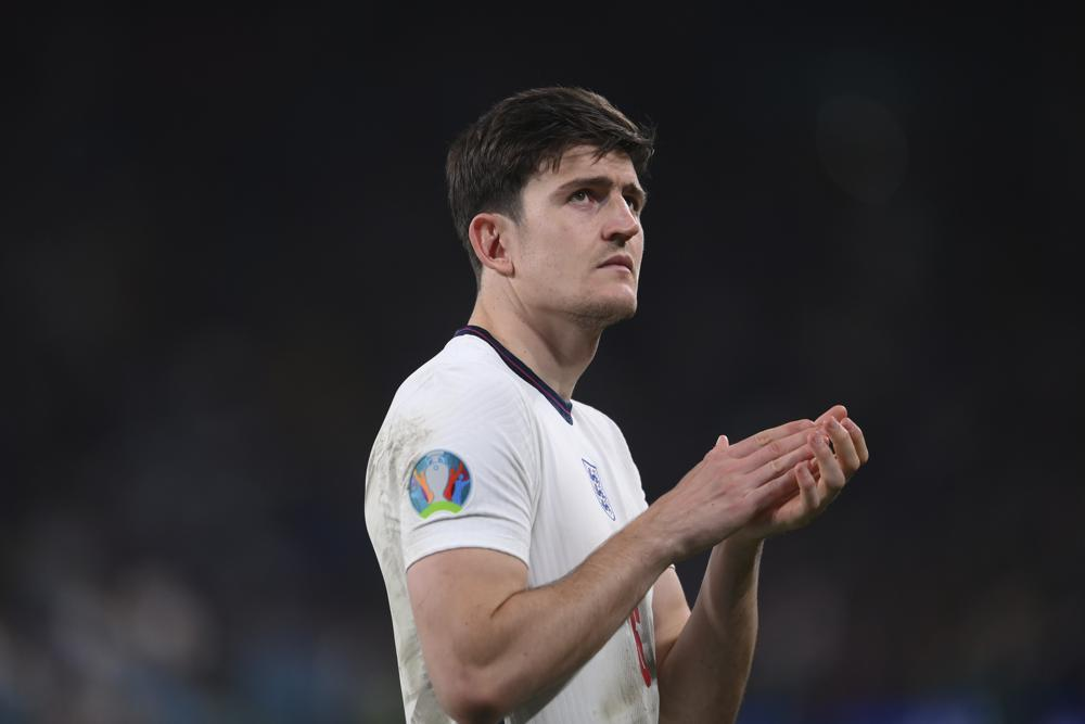 England's Harry Maguire applauds after the penalty shootout of the Euro 2020 soccer final match between England and Italy at Wembley stadium in London, Sunday, July 11, 2021. (Laurence Griffiths/Pool via AP) England's Harry Maguire applauds after the penalty shootout of the Euro 2020 soccer final match between England and Italy at Wembley stadium in London, Sunday, July 11, 2021. (Laurence Griffiths/Pool via AP)