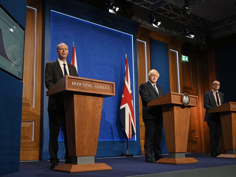 Chris Whitty, chief medical adviser to the UK government, in a 12 July press conference with Prime Minister Boris Johnson (centre) and chief scientific adviser Patrick Vallance (right).Credit: Daniel Leal-Olivas/AFP/Getty Chris Whitty, chief medical adviser to the UK government, in a 12 July press conference with Prime Minister Boris Johnson (centre) and chief scientific adviser Patrick Vallance (right).Credit: Daniel Leal-Olivas/AFP/Getty