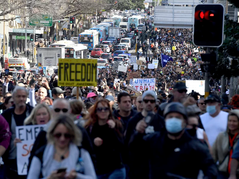 Protesters march through the streets in Sydney on Saturday. Mick Tsikas/AP Protesters march through the streets in Sydney on Saturday. Mick Tsikas/AP