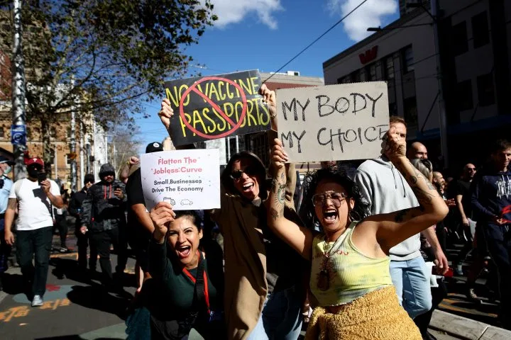 Protesters march down George St on July 24, 2021 in Sydney, Australia. Photo: Getty Images Protesters march down George St on July 24, 2021 in Sydney, Australia. Photo: Getty Images
