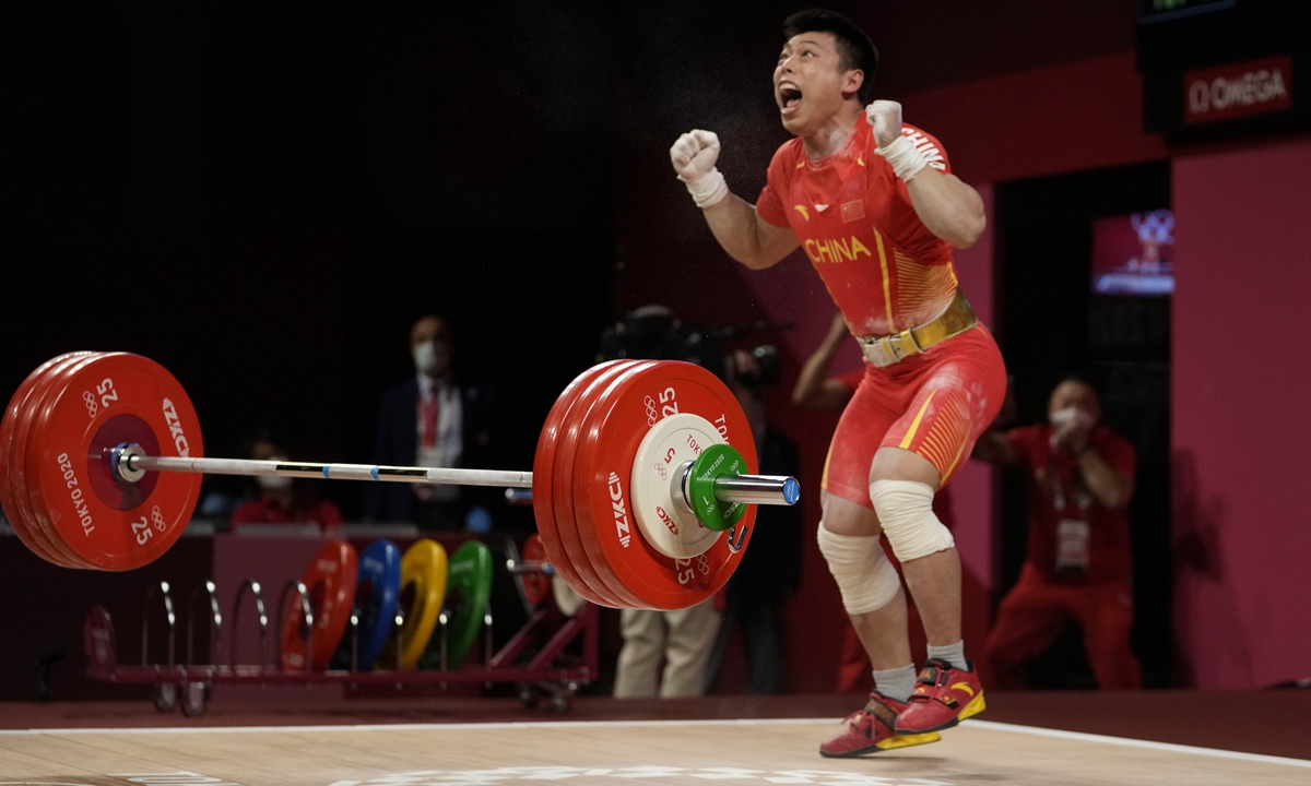 Chen Lijun celebrates after winning gold on Sunday in Tokyo, Japan. Photo: VCG Chen Lijun celebrates after winning gold on Sunday in Tokyo, Japan. Photo: VCG
