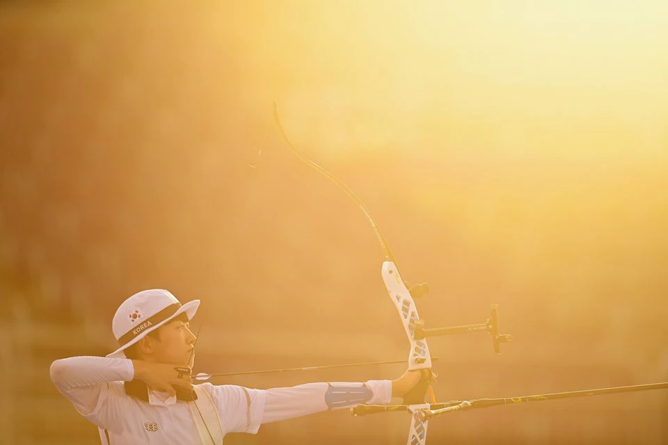 Tokyo 2020 Olympics - Archery - Women's Individual - 1/32 Finals - Yumenoshima Archery Field, Tokyo, Japan - July 29, 2021. An San of South Korea in action REUTERS/Clodagh Kilcoyne Tokyo 2020 Olympics - Archery - Women's Individual - 1/32 Finals - Yumenoshima Archery Field, Tokyo, Japan - July 29, 2021. An San of South Korea in action REUTERS/Clodagh Kilcoyne