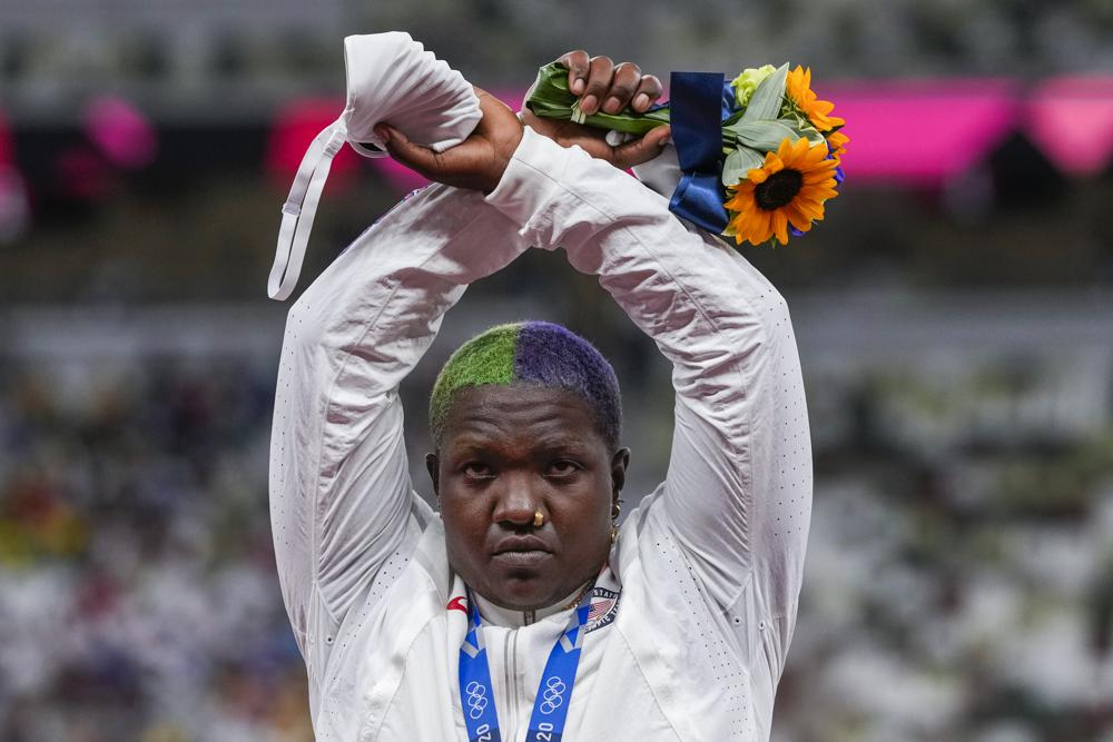 Raven Saunders, of the United States, poses with her silver medal on women's shot put at the 2020 Summer Olympics, Sunday, Aug. 1, 2021, in Tokyo, Japan. (AP Photo/Francisco Seco) Raven Saunders, of the United States, poses with her silver medal on women's shot put at the 2020 Summer Olympics, Sunday, Aug. 1, 2021, in Tokyo, Japan. (AP Photo/Francisco Seco)