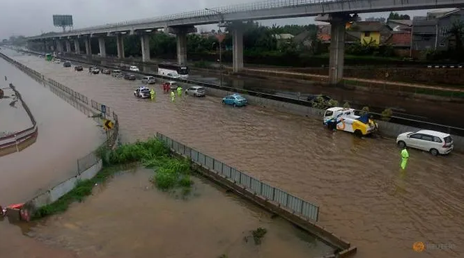 Flood death toll rises to 21 in Indonesia's capital Jakarta flood death toll rises to 21 in indonesias capital jakarta