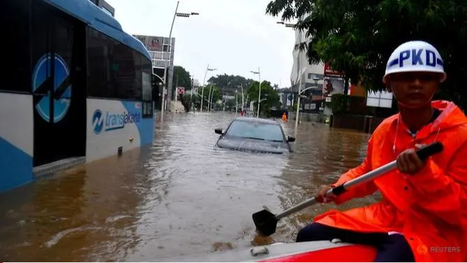 Flood death toll rises to 21 in Indonesia's capital Jakarta flood death toll rises to 21 in indonesias capital jakarta