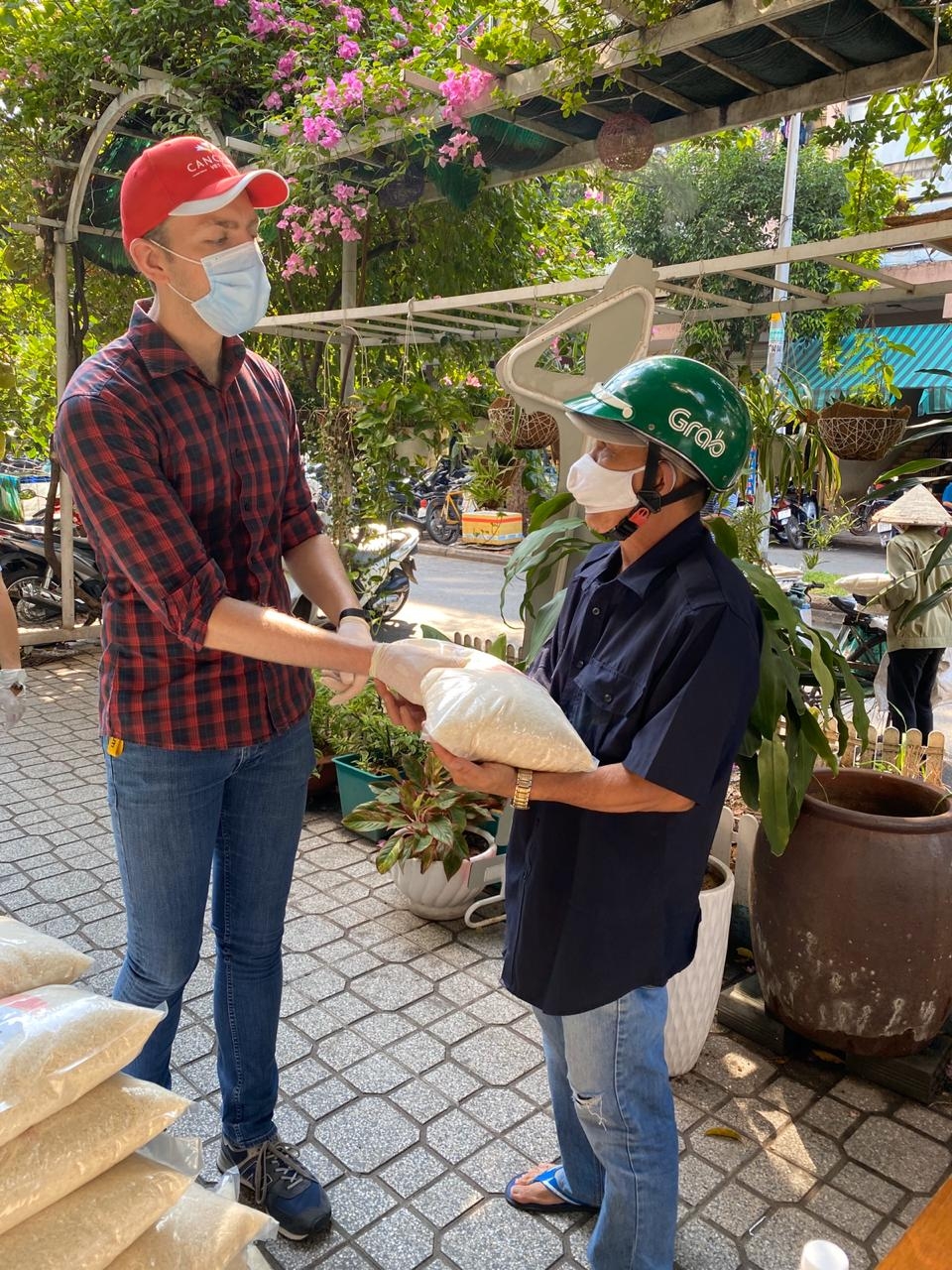 CanCham, VCF donate 5 tonnes of rice to 2,000 families in HCM city cancham vcf donate 5 tonnes of rice to 2000 families in need in hcm city