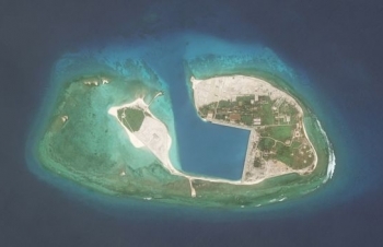 chinese aircraft landing at fiery cross reef vietnam urges parties not to further complicate situation