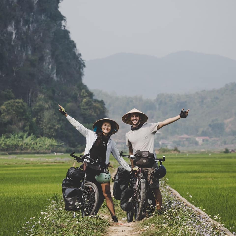 Vietnamese-French couple cycles from Europe to Asia for needy children vietnamese french couple cycles from europe to asia for needy children