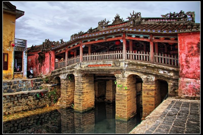 The Japanese Covered Bridge is an iconic symbol that defines Old Town Hoi An. This beautiful arched bridge was built in the 1590s to connect the Japanese quarter to the Chinese quarter, back during a time when Hoi An was a bustling international port town. The Japanese Covered Bridge is an iconic symbol that defines Old Town Hoi An. This beautiful arched bridge was built in the 1590s to connect the Japanese quarter to the Chinese quarter, back during a time when Hoi An was a bustling international port town