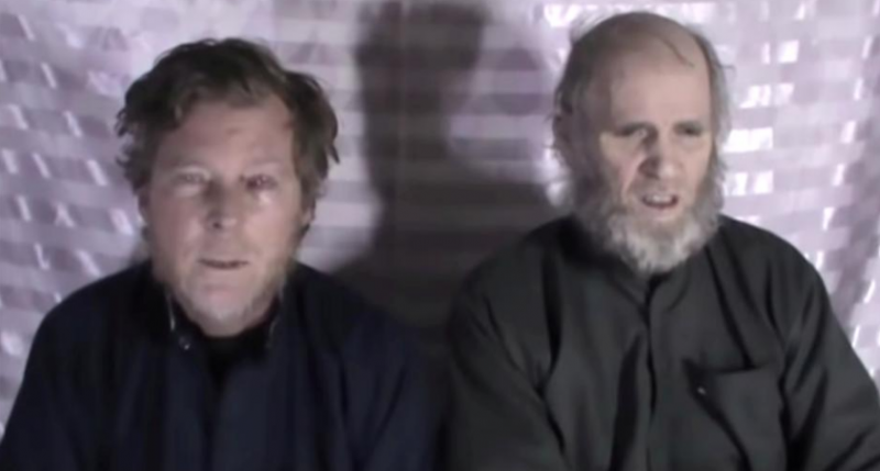 Taliban frees two Western prisoners taliban frees two western prisoners