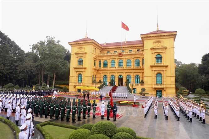 Lễ đón Thủ tướng Lào Phankham Viphavanh thăm chính thức Việt Nam Chú thích ảnh