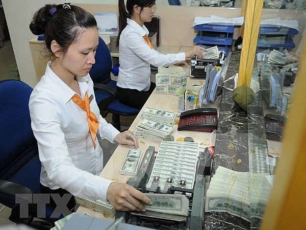 Bất chấp COVID-19, dòng kiều hối vẫn không ngừng tuôn chảy | Tài chính | Vietnam+ (VietnamPlus)