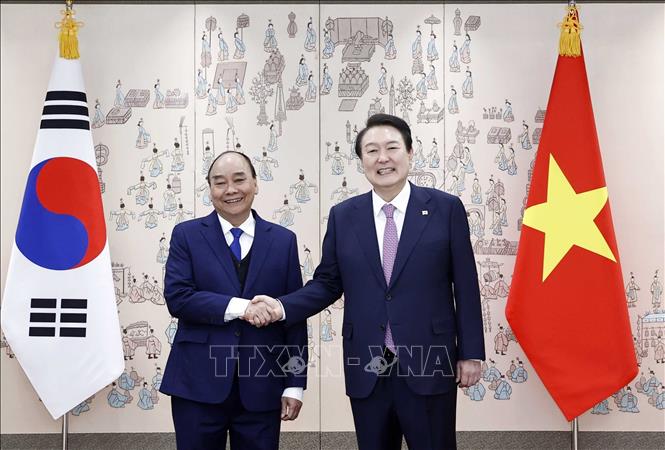 Lễ đón Chủ tịch nước Nguyễn Xuân Phúc thăm cấp Nhà nước tới Hàn Quốc Chú thích ảnh