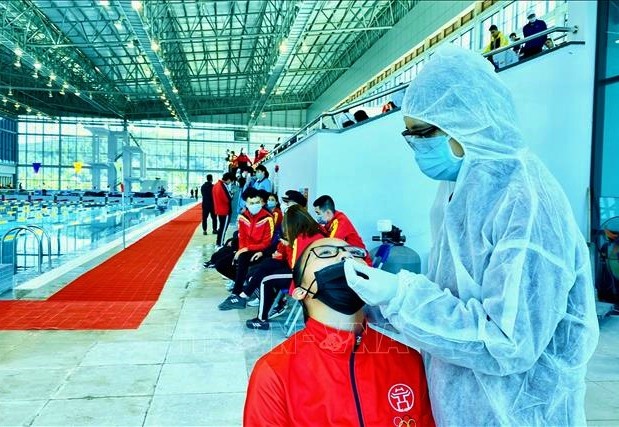 Các vận động viên, huấn luyện viên, trọng tài sẽ được lấy mẫu xét nghiệm virus SARS-CoV-2 trong vòng 24 giờ trước khi thi đấu- Ảnh: TTXVN. Các vận động viên, huấn luyện viên, trọng tài sẽ được lấy mẫu xét nghiệm virus SARS-CoV-2 trong vòng 24 giờ trước khi thi đấu- Ảnh: TTXVN.