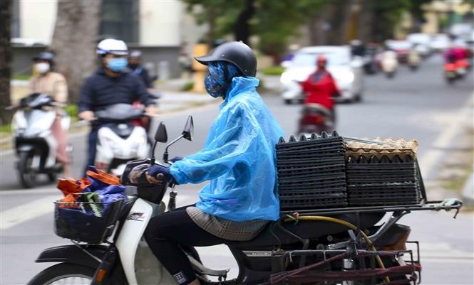 Không mưa. Trời rét với nhiệt độ thấp nhất phổ biến 14-17 độ. Ảnh: TTXVN Không mưa. Trời rét với nhiệt độ thấp nhất phổ biến 14-17 độ. Ảnh: TTXVN