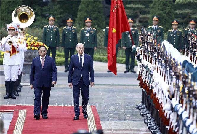 Lễ đón Thủ tướng Cộng hòa Liên bang Đức thăm chính thức Việt Nam Chú thích ảnh
