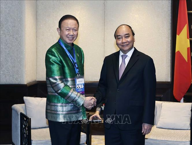 Chủ tịch nước Nguyễn Xuân Phúc tiếp Chủ tịch Hội hữu nghị Thái Lan - Việt Nam Chú thích ảnh