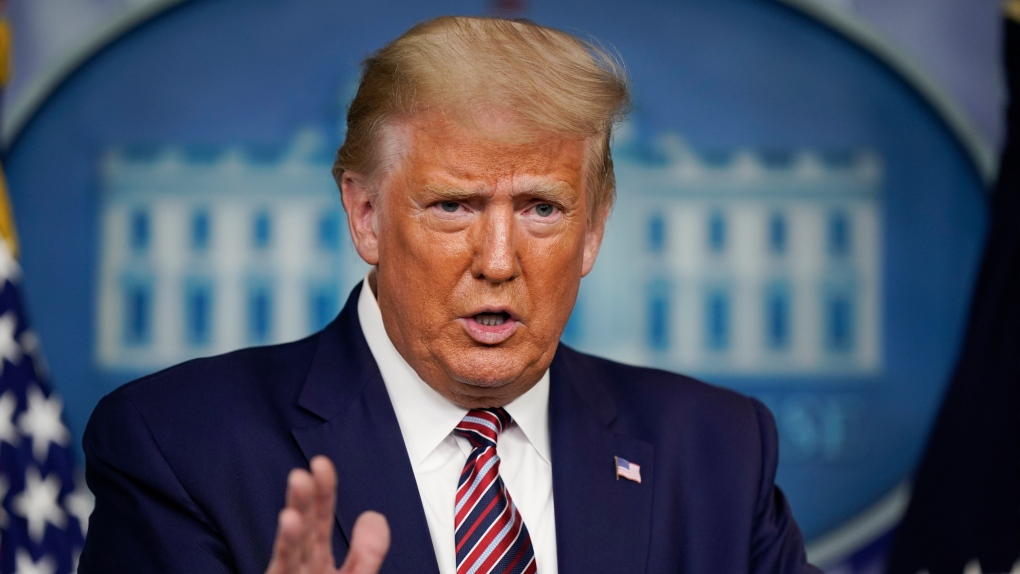 U.S. President Donald Trump gestures while speakings during a news conference at the White House, Sunday, Sept. 27, 2020, in Washington. (AP Photo/Carolyn Kaster) 0109 us president