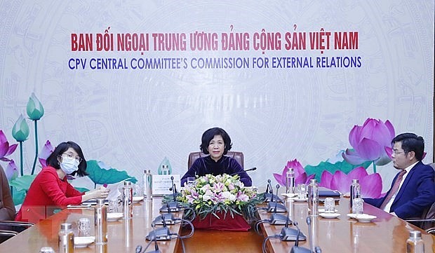 Deputy head of the Party Central Committee's Commission for External Relations Nguyen Thi Hoang Van (middle) at the event Deputy head of the Party Central Committee's Commission for External Relations Nguyen Thi Hoang Van (middle) at the event