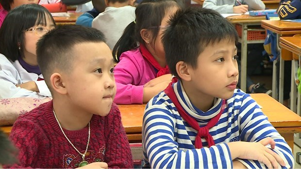 Schools nationwide will pilot the teaching of Korean and German as first foreign languages under a decision freshly issued by the Ministry of Education and Training (Photo: VNA) 2411-students
