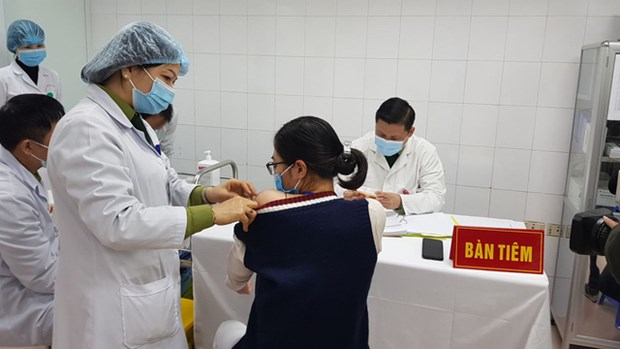 The highest dose, 75mcg, of Nanocovax was given to three volunteers in Hanoi on January 12. (Photo: MoH) 0314-vaccination